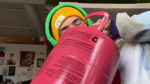 Man Tests Helium Blown Bubbles