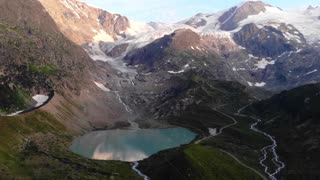 Aerial View Of Mountains With Snow