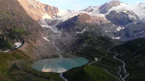 Aerial View Of Mountains With Snow