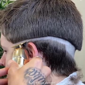You have to watch this guy's new hairstyle!