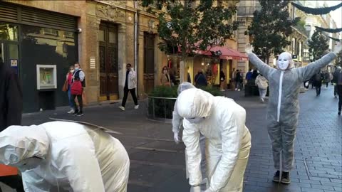 Les MAsques BLancs Toulouse Action Pancartes le 18 décembre