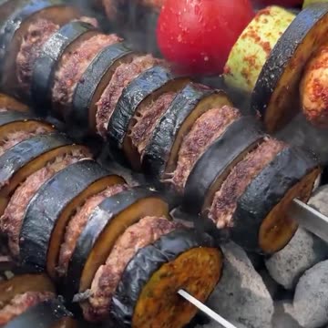 Family barbeque party with eggplant addition