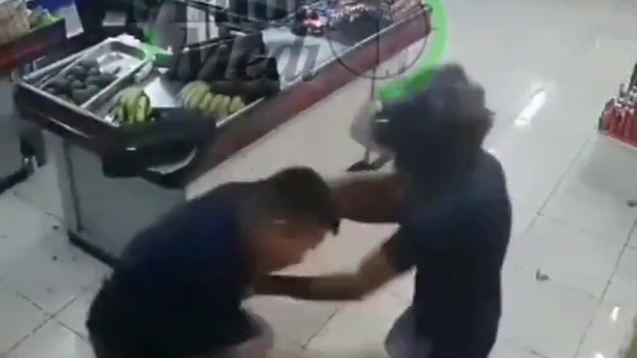 Entire store staff beats down a robber