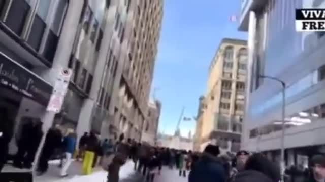 Protesters chant love, officers fire percussion grenades