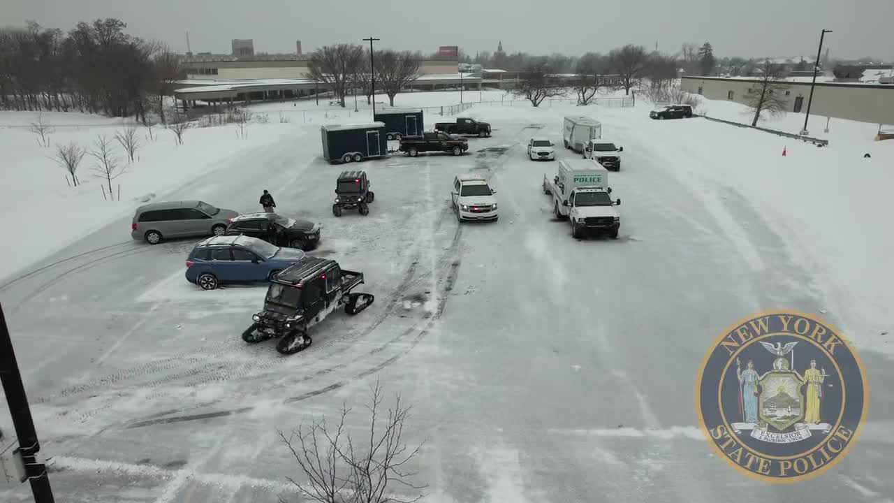 New York State troopers deliver food and water to Buffalo residents