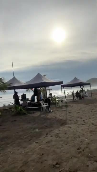 4:20 in afternoon beach scene at the cocal casino jaco beach Costa Rica