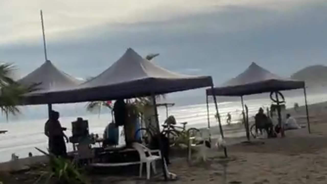 4:20 in afternoon beach scene at the cocal casino jaco beach Costa Rica