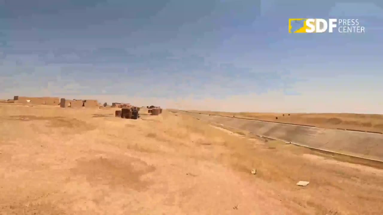 First-person combat between Kurds and Syrian fighters.