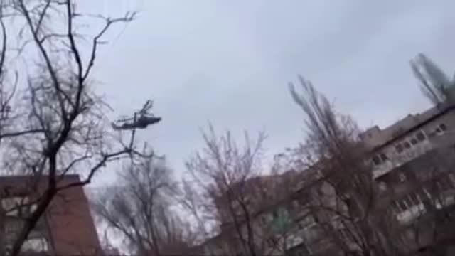 Russian combat helicopter "K-52" in the sky over Donetsk