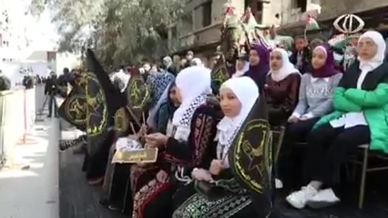 Al Quds Brigade march through Yarmouk suburb in Damascus