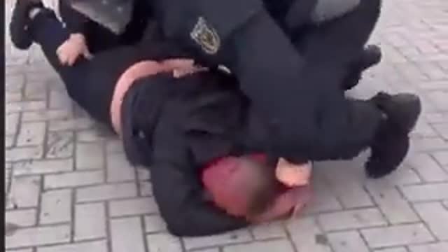 German police ruthlessly beating protesters