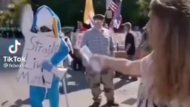 "is this a joke?" she asked the man dressed in a shark costume