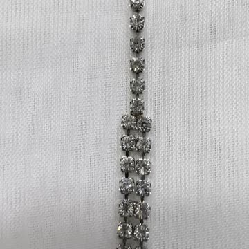 Rhodium Plated 16.5” Necklace. Made with Swarovski Crystal. Faux Pearl