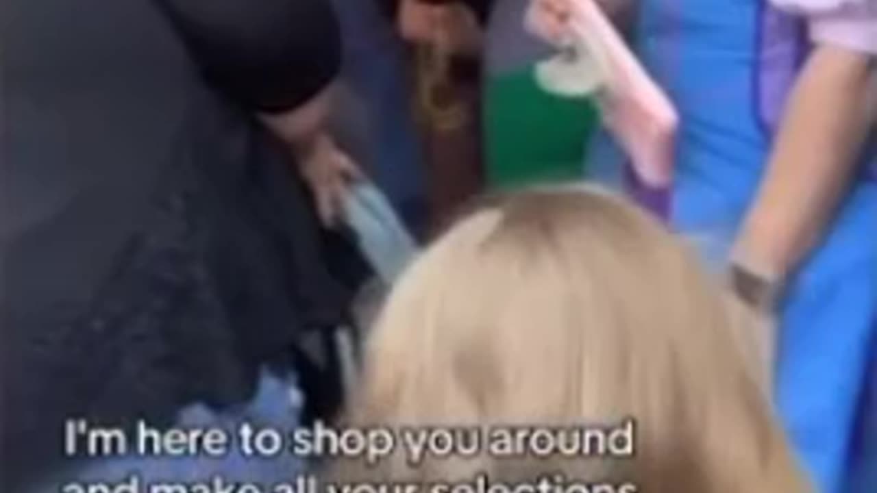 Disneyland Has Men Dressed as a Fairy Godmother Greeting Children in a Dress Store