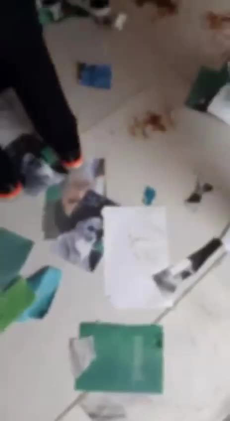 Iranian Schoolgirls Remove their Compulsory Hejab and Chant “Death to the Dictator” While Stomping on Photos of Their Rulers.