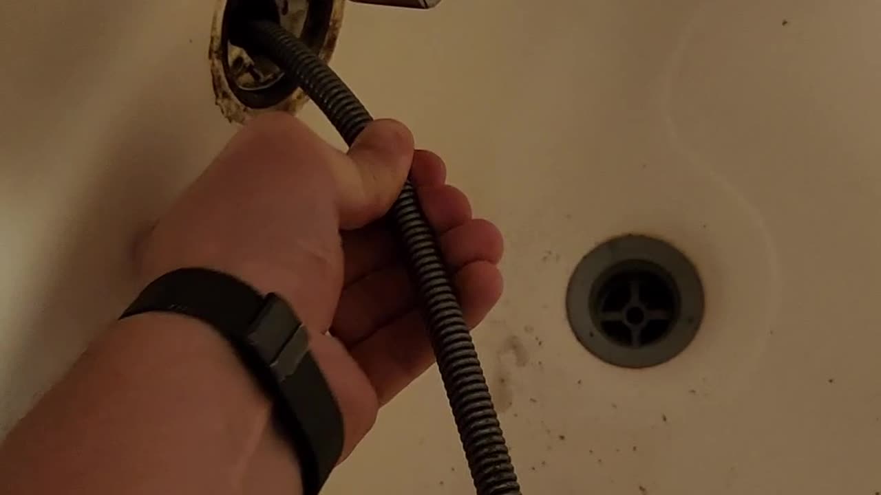 How to snake a clogged drain