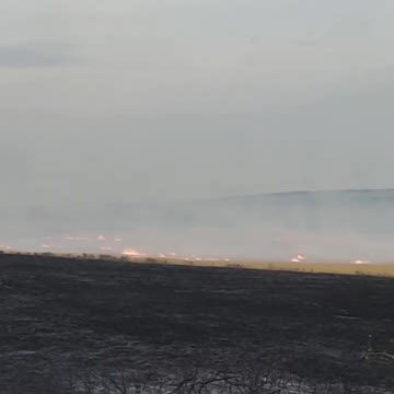 Burning fields in Ukraine caused by Russian vandals in autumn 2022