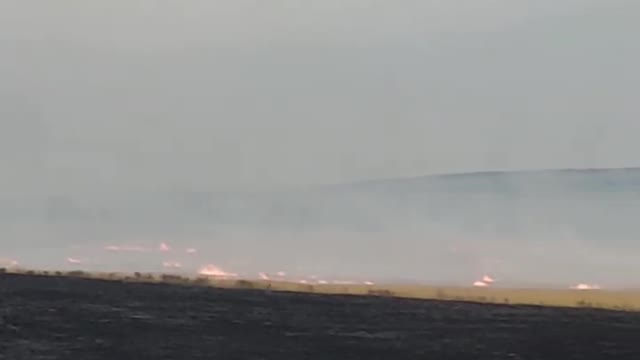 Burning fields in Ukraine caused by Russian vandals in autumn 2022