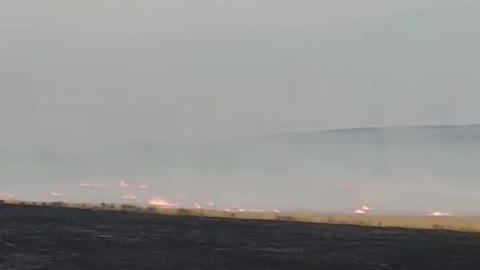 Burning fields in Ukraine caused by Russian vandals in autumn 2022