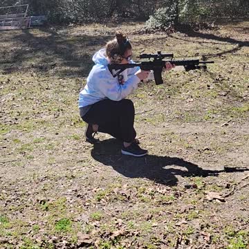 Wife shooting her AR15