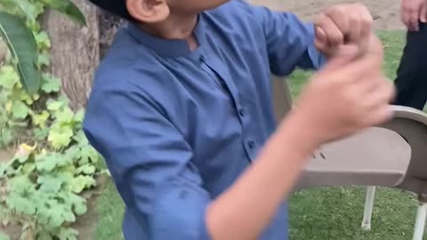 Child enjoying kite in village