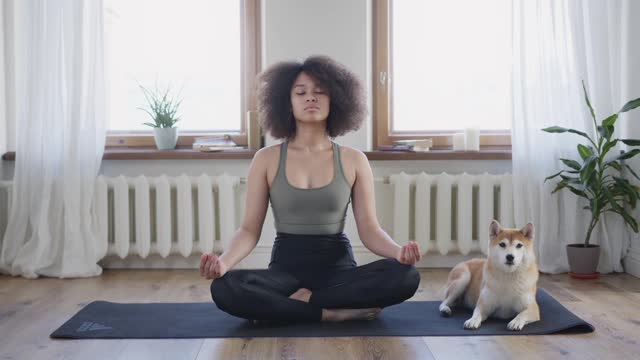 A beautiful girl practicing yoga.