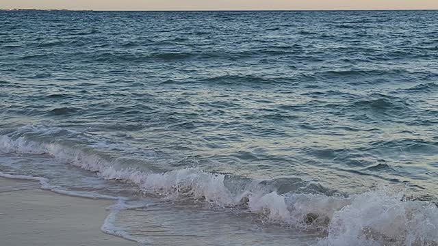 waves coming in at the beach at Dreams resort at Playa Mujeres, Mexico