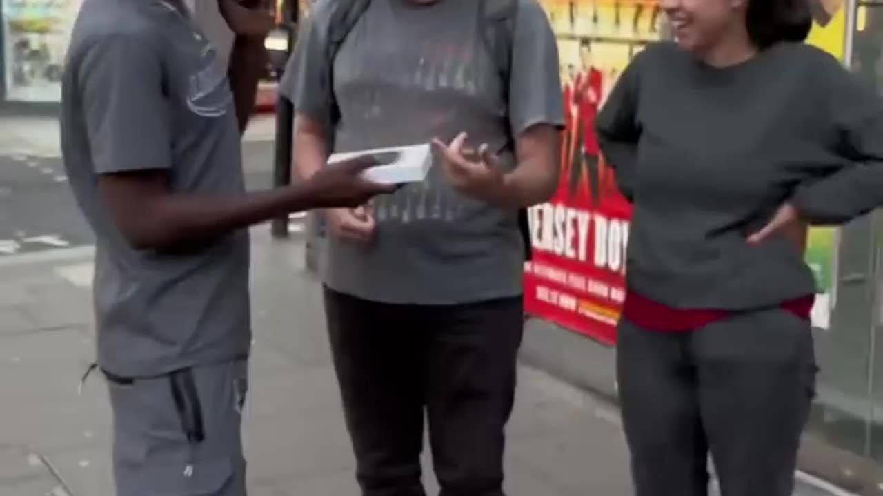 Asking For Hug to Strangers and Surprise them With An iPhone