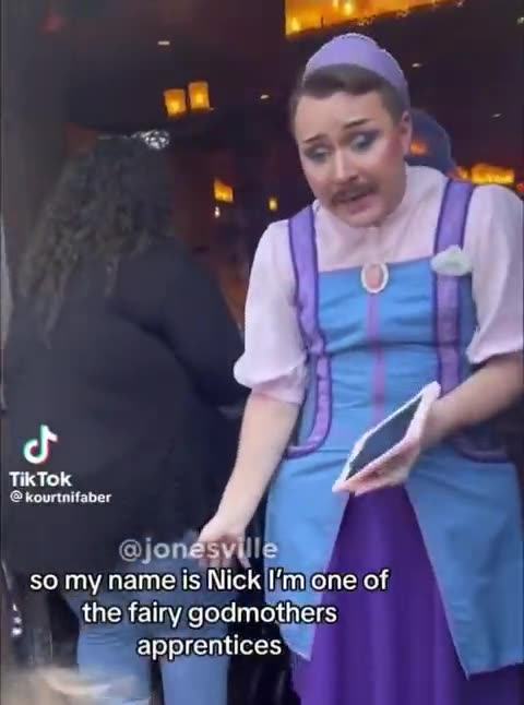 Disney employs a biological male in a dress to greet little girls at the dress store in Disneyland