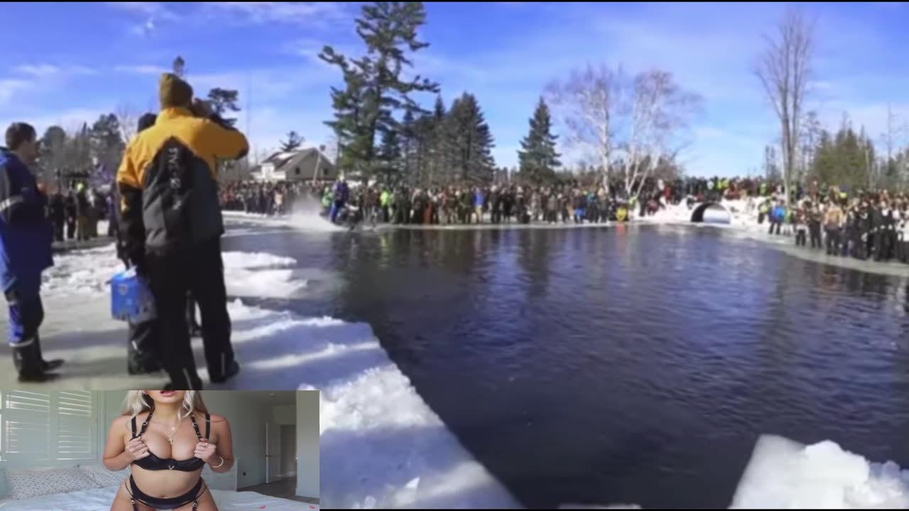 Snowmobiles drowing and crashing