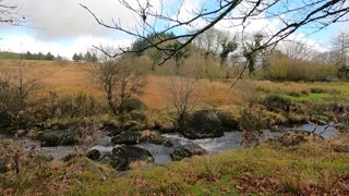 By a beautiful river.