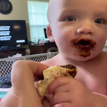 Twin A gets chocolate for first time