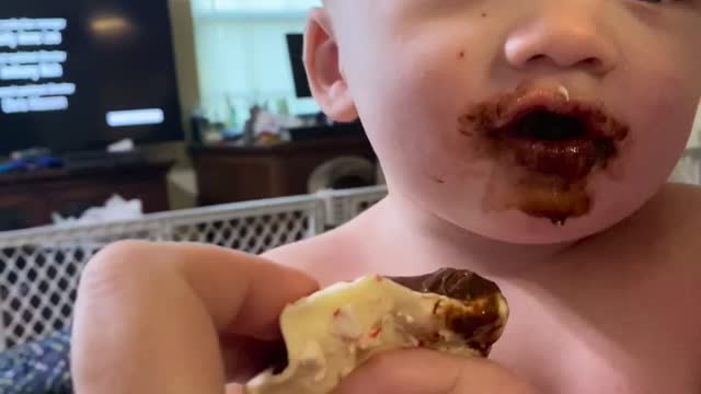 Twin A gets chocolate for first time