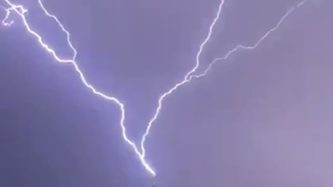 Powerful lightning strikes the Clock Tower in Mecca