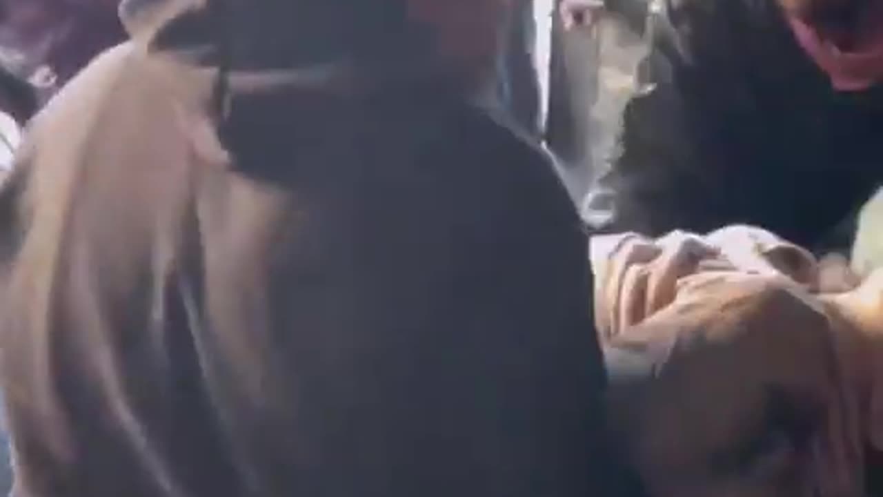 Young Palestinian girl rescued from beneath the debris of her house