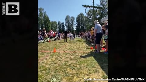 YE OLDE BALL AND CHAIN! Couples Compete in Wife-Carrying Contest