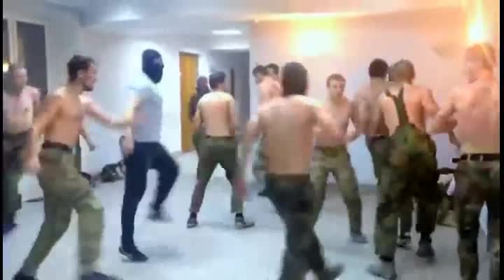Ukraine soliders shout white power while attempting to mosh