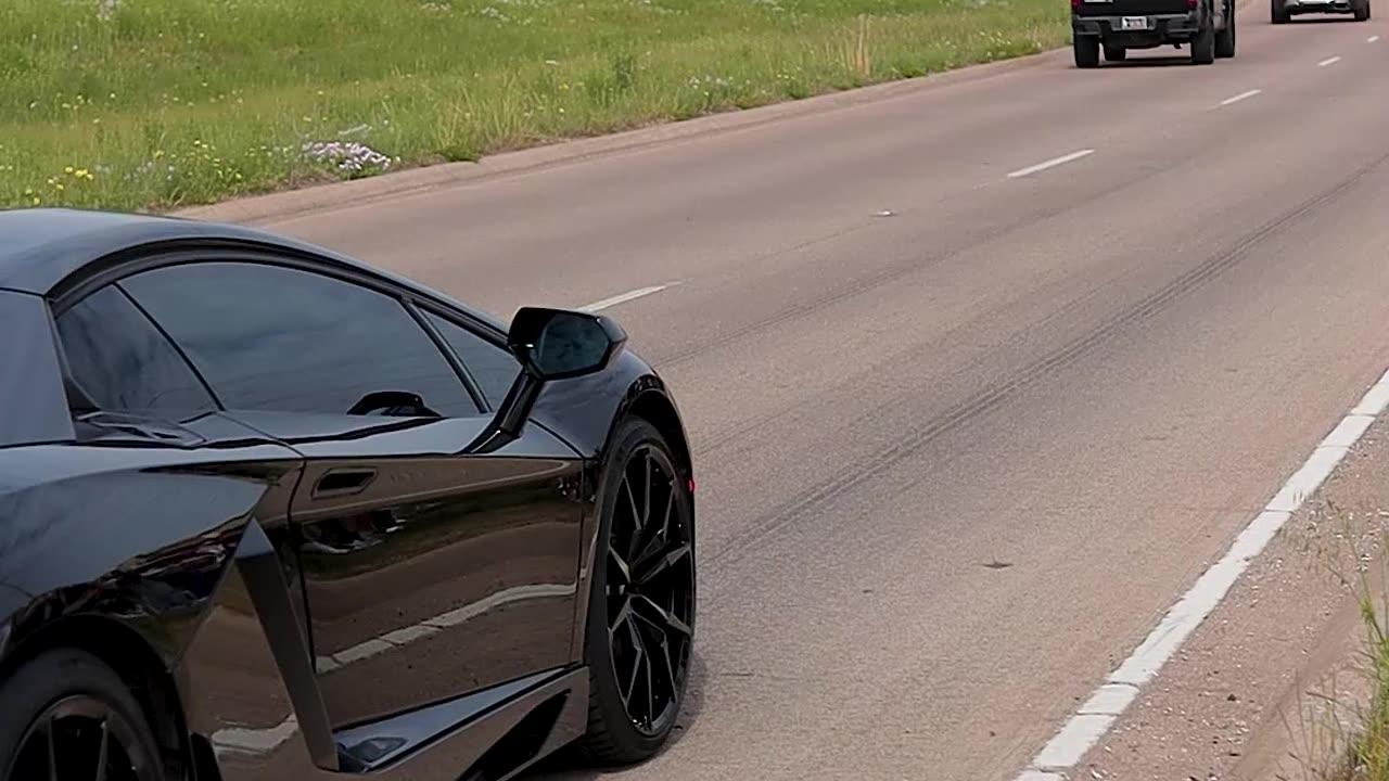 Lamborghinis Leaving Cars and Coffee