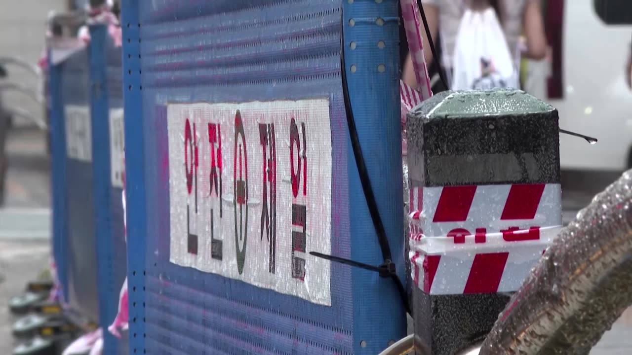 Car plows into crowd in Seoul leaving nine dead