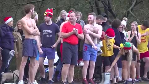 Hundreds take plunge for chilly Christmas Day swim