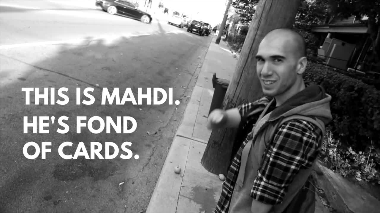 Handless magician demonstrates inspiring card tricks