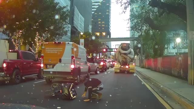 Bicycle Courier Almost Crushed by Truck