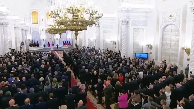 The moment when Putin signed agreements on the accession of the DPR, LPR