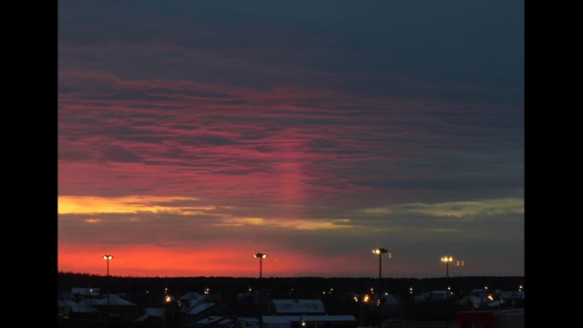 Sunsets and bright purple ray of light in the sky