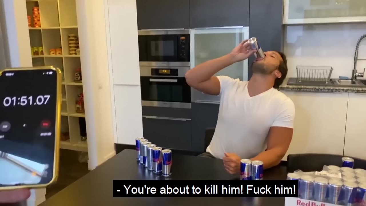 TRISTAN TATE BREAKS THE RED BULL DRINKING WORLD RECORD