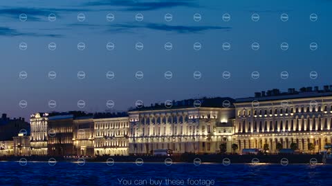 ST. PETERSBURG, RUSSIA - JUNE 16, 2017: Illuminated historic buildings on an embankment of the Neva