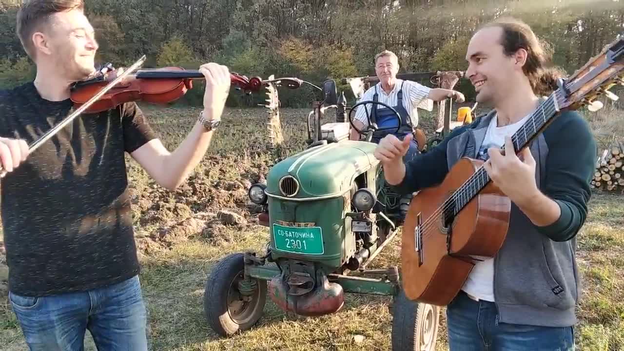 Serbian music with tractor following the rythm