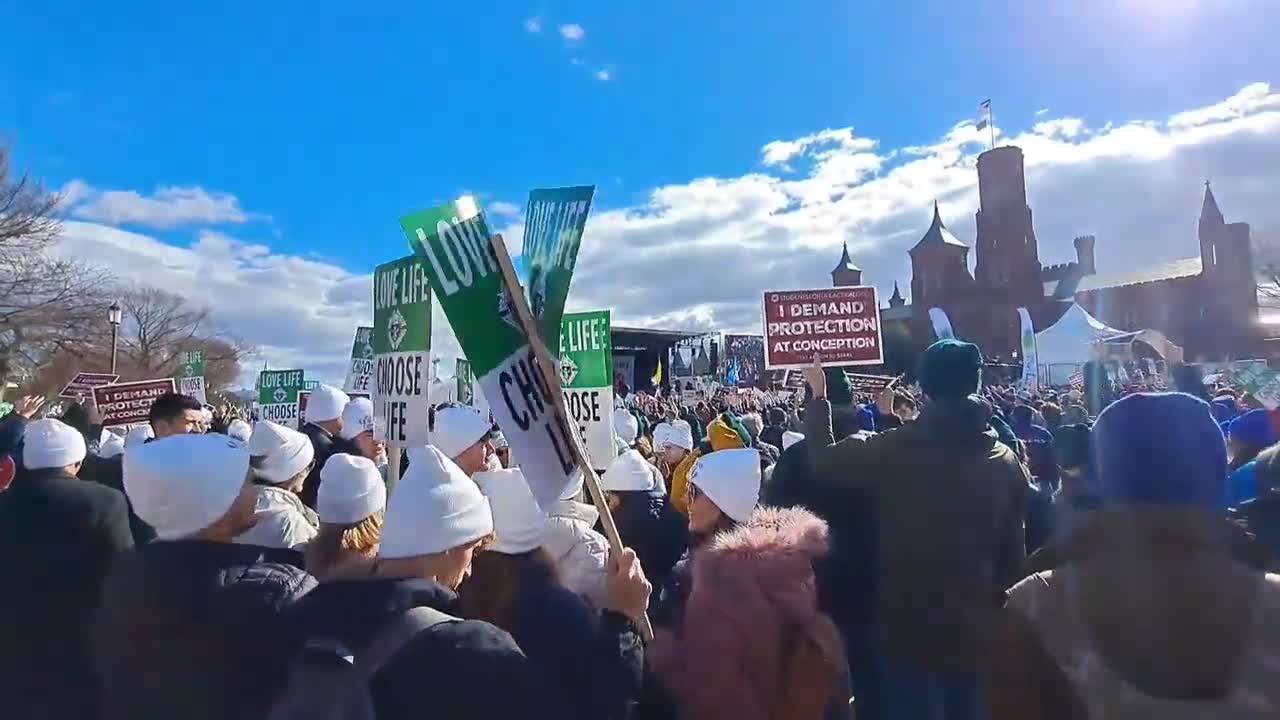 Crowds wave signs in DC ahead of March for Life rally