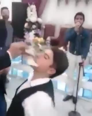 Young man dancing at a wedding party