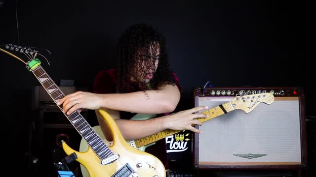 He played two guitars at the same time!